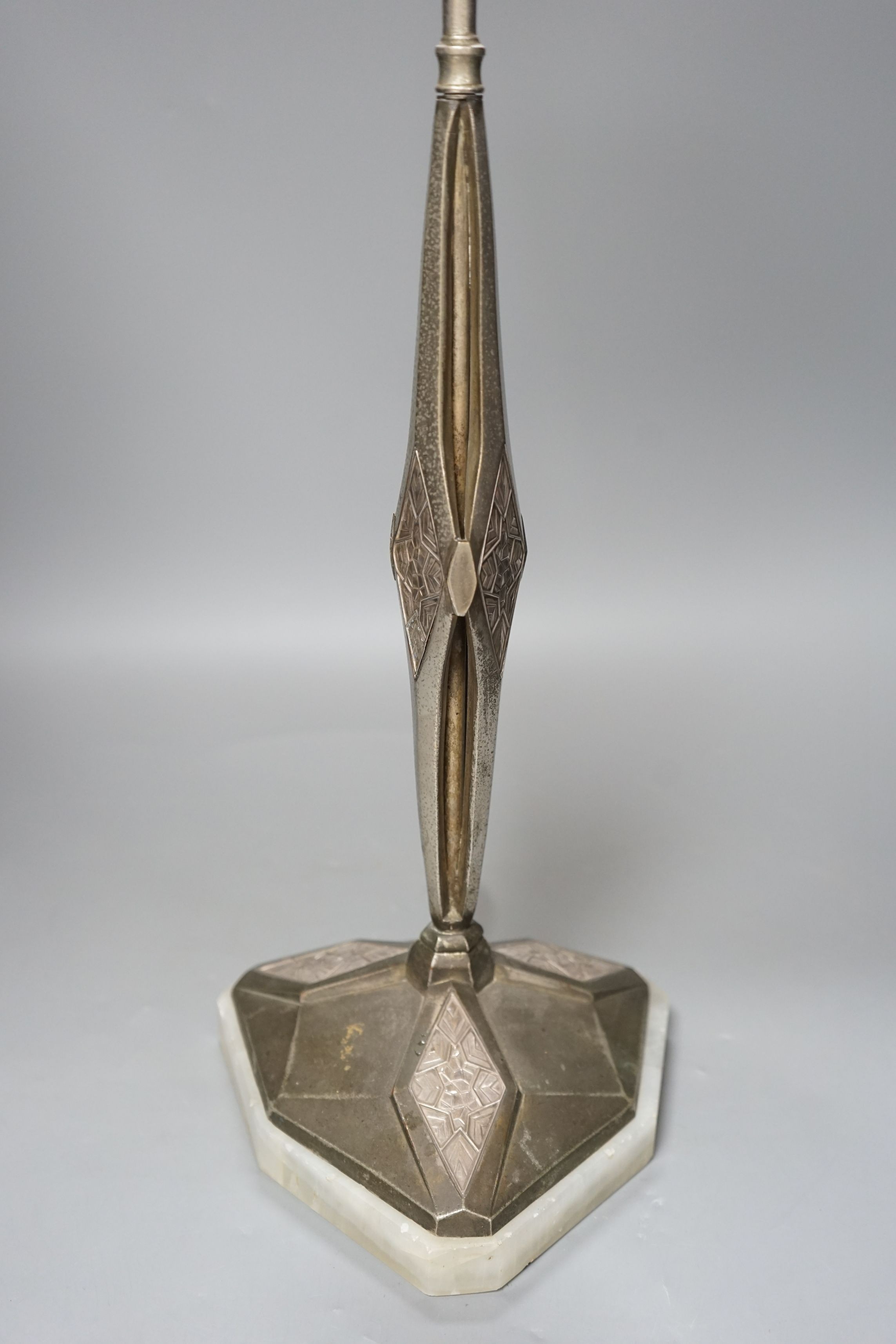 A Secessionist metal table lamp base - indistinctly initialled, 64cms high